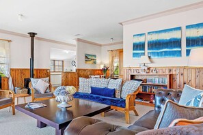 Comfortable living room with lake views and fireplace!