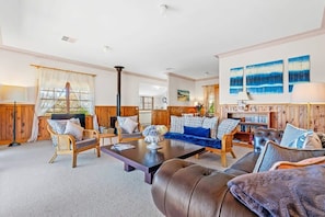 Open plan living area with lake views and fireplace!