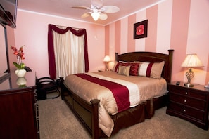 King bedroom 1 - With   LCD TV/DVD, Alarm clock, Dresser/Mirror,  Walk in Closet