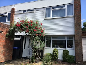 Parking space on driveway next to house