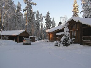 Car shelter and Main house.