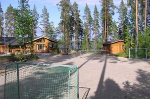 Playing field, main house and guest house.
