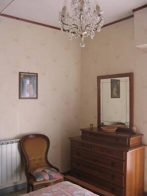 Master bedroom with crystal chandelier