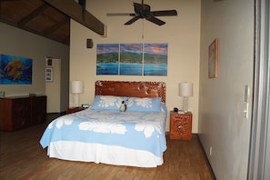 Cal-King bed provides a view of the ocean & allows for a peaceful night's sleep