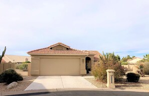 Front of house looking Southwest.