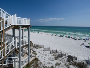 Enjoy a private deck leading to walkway with complimentary beach set-up