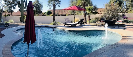 Large back yard with private pool and 6' stucco walls surrounding entire yard