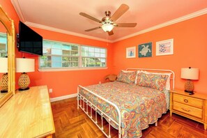 Guest bedroom #1: Queen bed, TV, dresser and side tables.