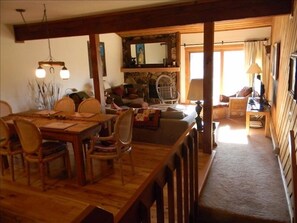 Sun streaming into dining room and living room.