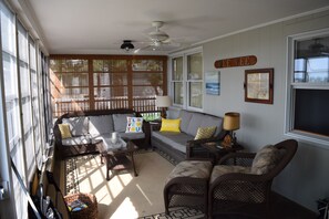 Comfortable porch for relaxing. Great at night too.