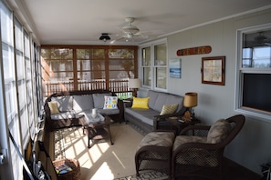 Comfortable porch for relaxing. Great at night too.