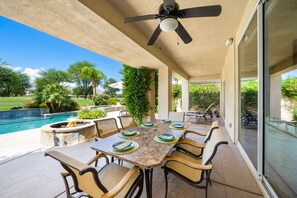 Outdoor dining, fire pit ready to go.