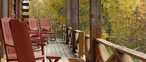 Relax while rocking on the covered porch while watching deer and wildlife