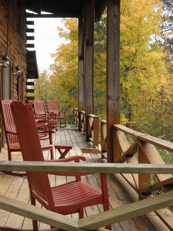 Relax while rocking on the covered porch while watching deer and wildlife