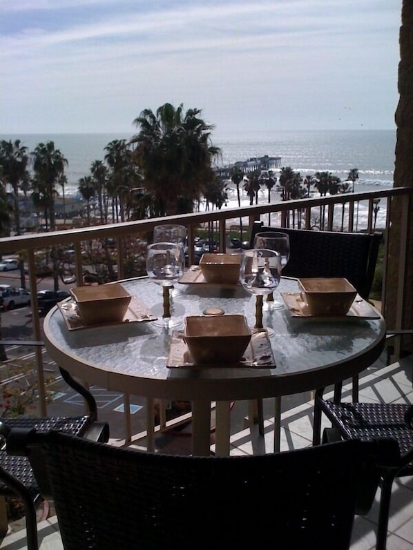 Enjoy dinner and sunsets on the patio with fantastic views of the ocean and pier