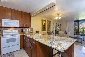 remodeled kitchen with granite countertops