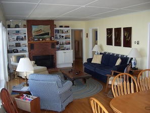 taken from sunroom door looking through dining/living area.