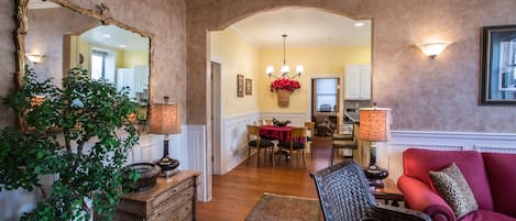 Huge, bright living space opens into dining area, kitchen and then bedroom.