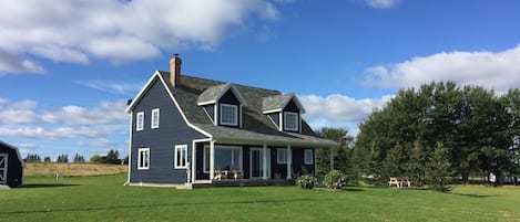 A Sight to Sea Cottage. Plenty of windows to view the pretty coastal setting.