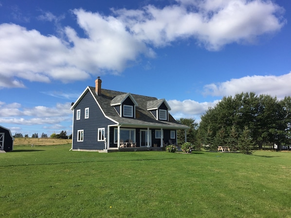 A Sight to Sea Cottage. Plenty of windows to view the pretty coastal setting.