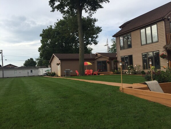 View of the back deck and Condo attached to the owners house on the right
