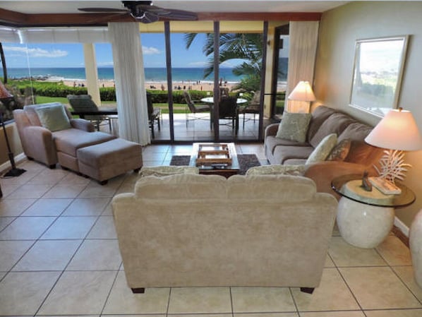 Living room with views of ocean. Now with new recliner in corner.