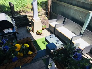 A little backyard goes a long way to hang out with family, friends or pets