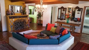 Super fun sunken seating / conversation pit in the living room