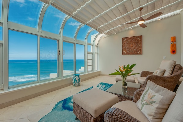 Whale watch from your living room in the winter or watch snorkelers and surfers.