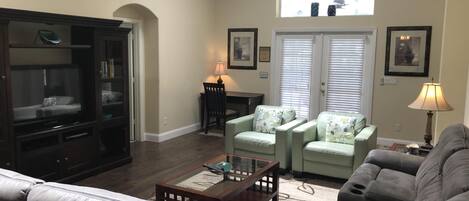 Family room, 3 skylights let the natural light flood into our home.