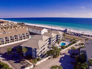 The Summer Breeze Complex is directly across the street from Miramar Beach.
