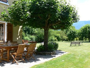 Lunch on the terrace shaded by the lime tree