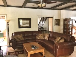 Living room with view of front entry hall