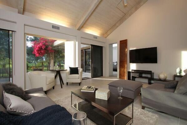 Living room. Sliders lead to back patio.