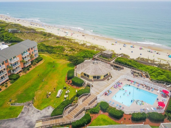 D building, pool, clubhouse, ocean