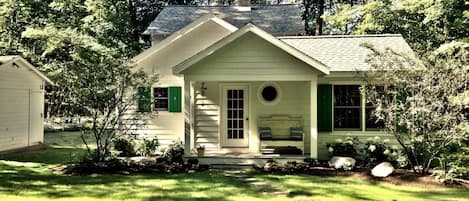 View of home from the backyard w/welcoming landscaping.