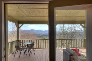 Family and friends can enjoy the views of several ranges from this covered porch