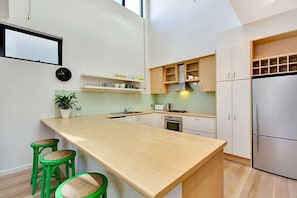 Kitchen with void above