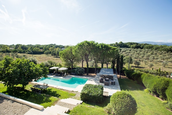 Panoramic views over an olive grove, the countryside and the maritime alps.