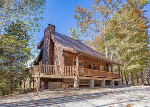 Private, 3 story log cabin with mountain/river views and large enclosed decks..