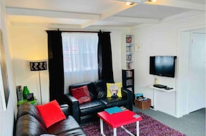 Cosy and comfortable lounge room with a big selection of DVDs