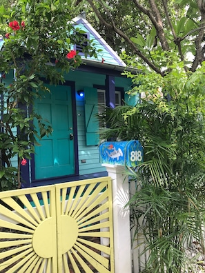 Attention to details.hand painted mailbox! Bike rack inside gated compound