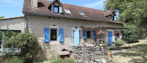 South side of house with shaded terrace  