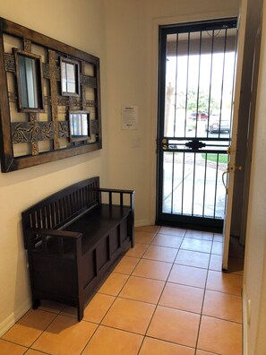 Front door with new screened security door.  
