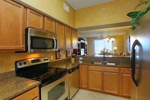 Clean Modern Kitchen with Stainless Steel Appliances