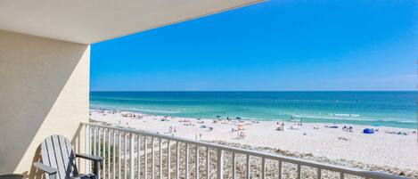 The balcony includes quality outdoor seating to enjoy your morning coffee..or mimosa.