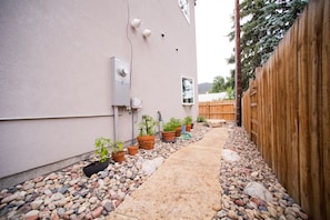 Flagstone path to entry door, private and secluded