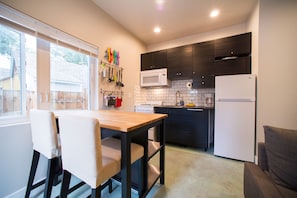 Kitchen, note large sunny window (has a blind for privacy)