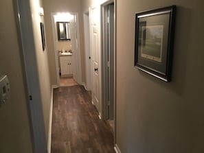 Hallway to 2nd bathroom and extra bedrooms