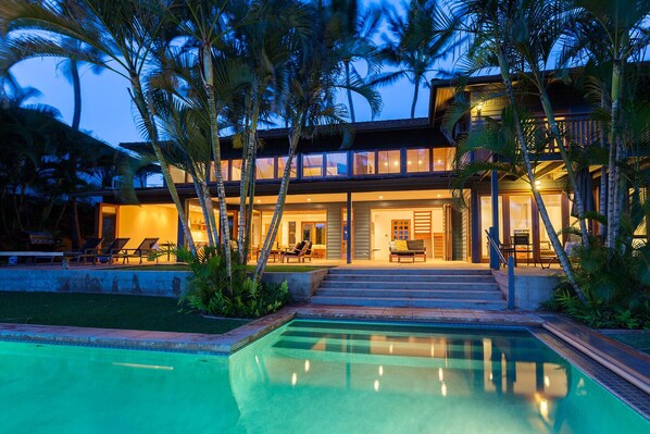 evening glow of the pool and home